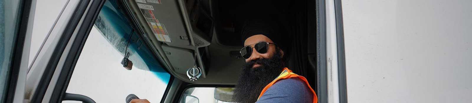 Truck driver behind the wheel of his truck